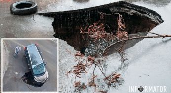 У Дніпрі в асфальті на дорозі утворилося величезне провалля: у «пастку» потрапило й авто